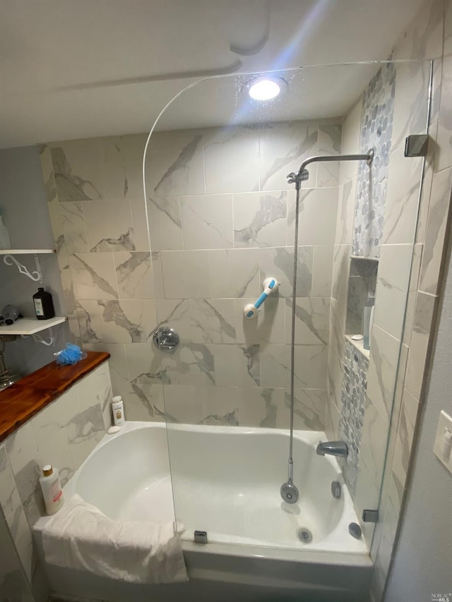 bathroom with shower / bathing tub combination