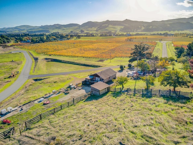 drone / aerial view with a rural view and a mountain view