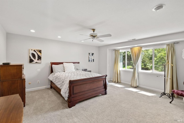 bedroom featuring ceiling fan, light colored carpet, baseboards, visible vents, and recessed lighting