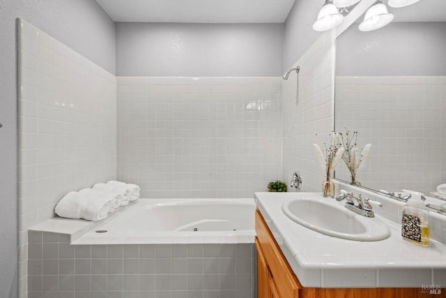 bathroom with walk in shower, a jetted tub, tile walls, and vanity