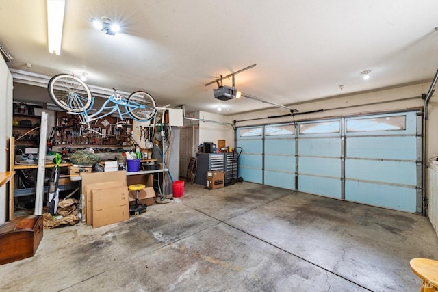 garage featuring a garage door opener