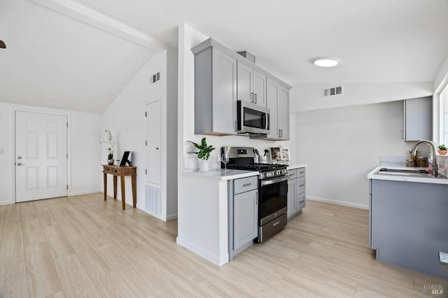 240 Rinaldo Dr, Vallejo, CA 94589 - kitchen featuring stainless steel appliances, light countertops, visible vents, gray cabinets, and a sink