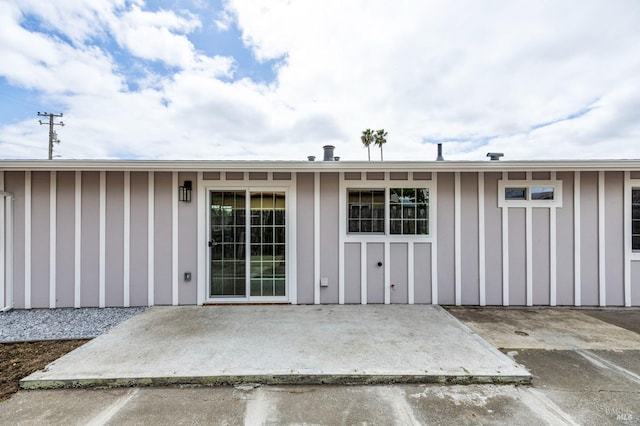 240 Rinaldo Dr, Vallejo, CA 94589 - property entrance featuring board and batten siding and a patio area