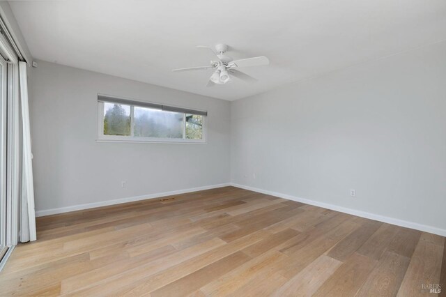 331 Laurel Leaf Pl, Santa Rosa, CA 95409 - unfurnished bedroom featuring light wood-type flooring, baseboards, and ceiling fan
