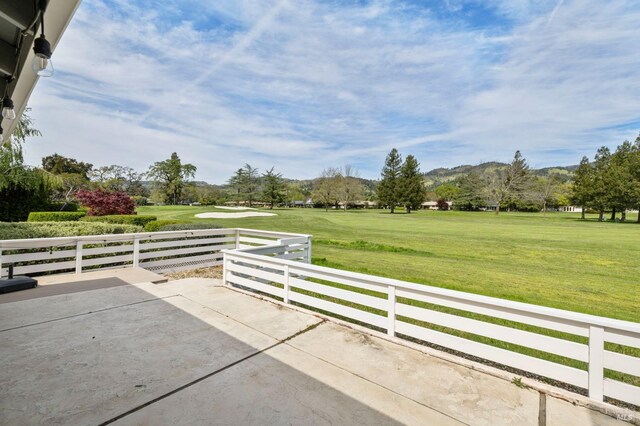 331 Laurel Leaf Pl, Santa Rosa, CA 95409 - view of gate with fence, a lawn, a patio, and golf course view
