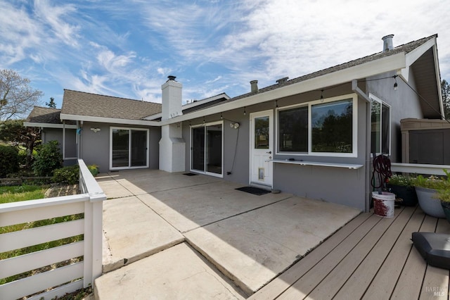 331 Laurel Leaf Pl, Santa Rosa, CA 95409 - rear view of property featuring roof with shingles, a chimney, a wooden deck, a patio area, and stucco siding