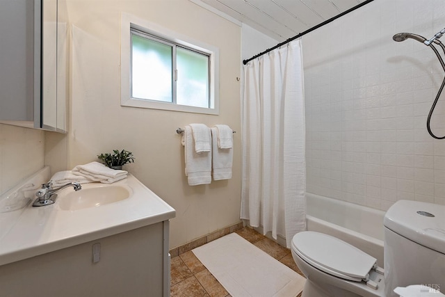 full bathroom featuring shower / bath combo, vanity, toilet, and baseboards