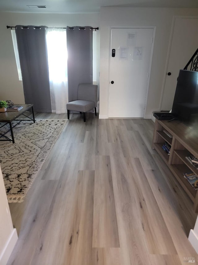 106 Oliva Ct Unit C, Novato, CA 94947 - living area featuring visible vents and light wood-style floors
