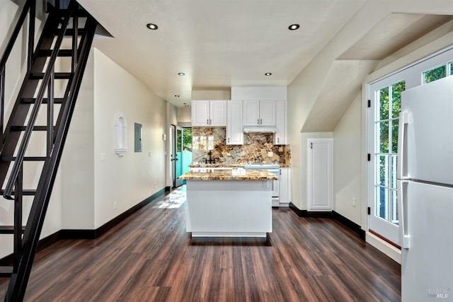 542 College Ave, Santa Rosa, CA 95404 - kitchen with tasteful backsplash, baseboards, dark wood-style flooring, and white appliances