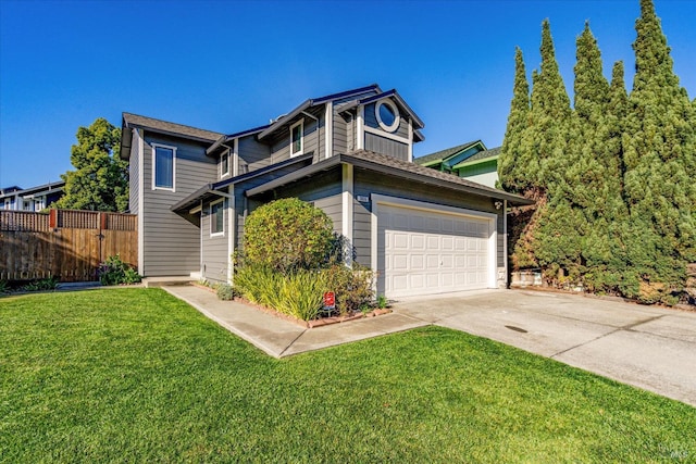 traditional-style home featuring a garage, a front lawn, concrete driveway, and fence