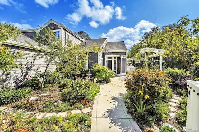 470 Camellia Ct, Benicia, CA 94510 - rear view of property featuring roof with shingles and a patio area