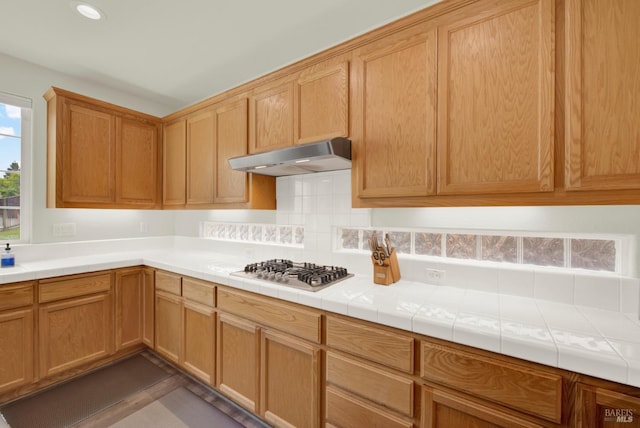 kitchen featuring recessed lighting, stainless steel gas cooktop, and under cabinet range hood