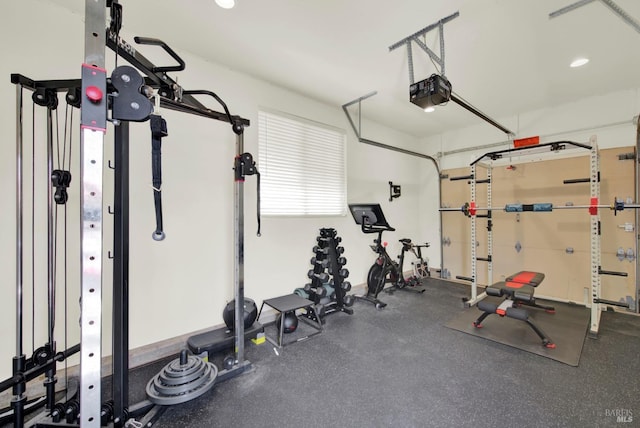 exercise room with recessed lighting