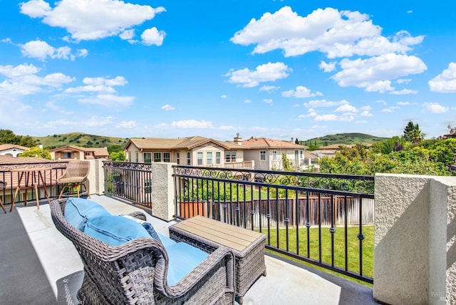 balcony featuring a residential view
