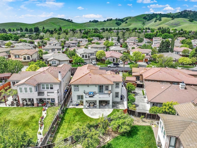 drone / aerial view with a mountain view and a residential view