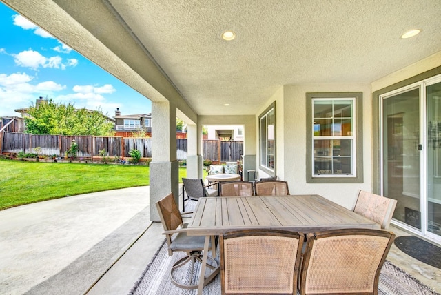 view of patio / terrace with a fenced backyard and outdoor dining space