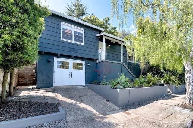 11 Cedar St, San Anselmo, CA 94960 - raised ranch featuring stucco siding, stairway, and fence