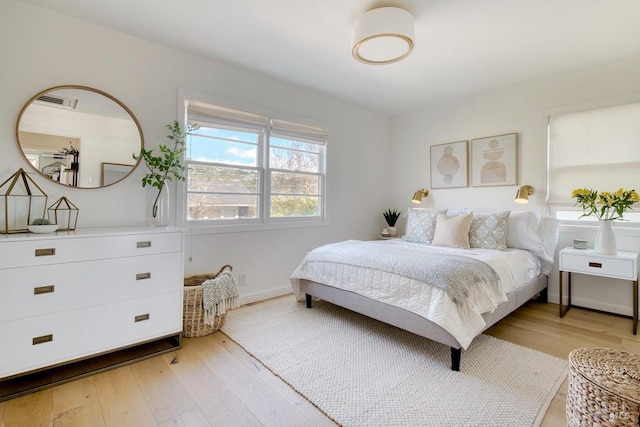 11 Cedar St, San Anselmo, CA 94960 - bedroom with baseboards and light wood-style floors