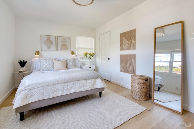 11 Cedar St, San Anselmo, CA 94960 - bedroom with baseboards and light wood-type flooring