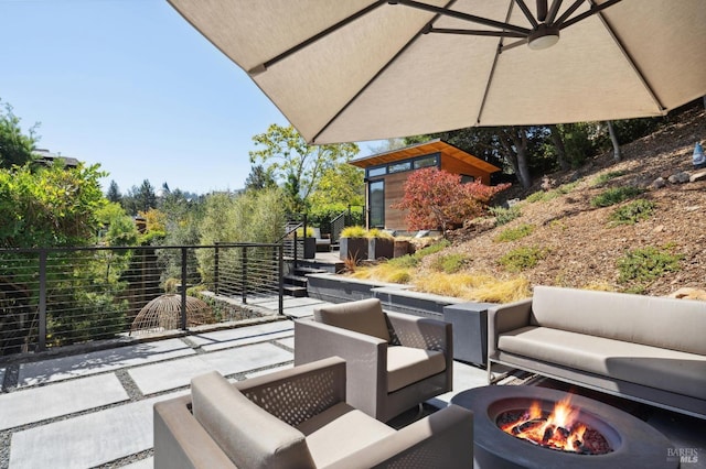 11 Cedar St, San Anselmo, CA 94960 - view of patio / terrace featuring an outbuilding and an outdoor living space with a fire pit