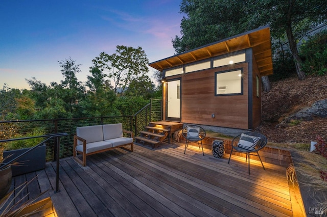 11 Cedar St, San Anselmo, CA 94960 - deck at dusk with an outdoor hangout area and an outdoor structure