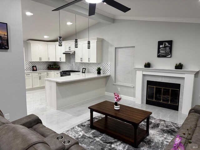 4187 Tokay Dr, Napa, CA 94558 - living area featuring light marble finish flooring, a ceiling fan, crown molding, recessed lighting, and a tiled fireplace