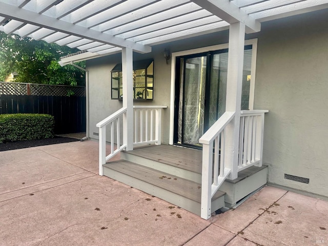 exterior space featuring fence, a patio area, and a pergola