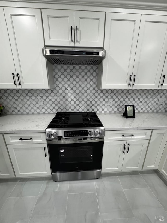 4187 Tokay Dr, Napa, CA 94558 - kitchen featuring stainless steel range with gas stovetop, extractor fan, white cabinets, light stone counters, and decorative backsplash