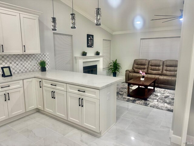 4187 Tokay Dr, Napa, CA 94558 - kitchen featuring open floor plan, a peninsula, light marble finish flooring, white cabinets, and a fireplace