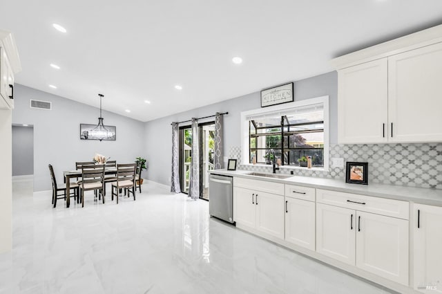 4187 Tokay Dr, Napa, CA 94558 - kitchen featuring dishwasher, a sink, decorative backsplash, lofted ceiling, and light countertops