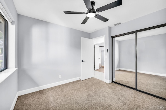 4187 Tokay Dr, Napa, CA 94558 - unfurnished bedroom featuring carpet, baseboards, a ceiling fan, and a closet