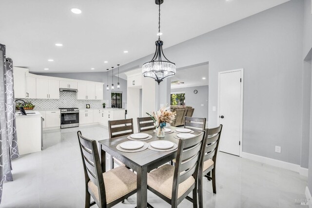 4187 Tokay Dr, Napa, CA 94558 - dining area with recessed lighting, a chandelier, vaulted ceiling, baseboards, and light tile patterned flooring
