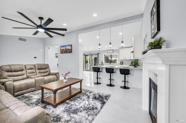 4187 Tokay Dr, Napa, CA 94558 - living area featuring recessed lighting, ceiling fan, crown molding, and a fireplace