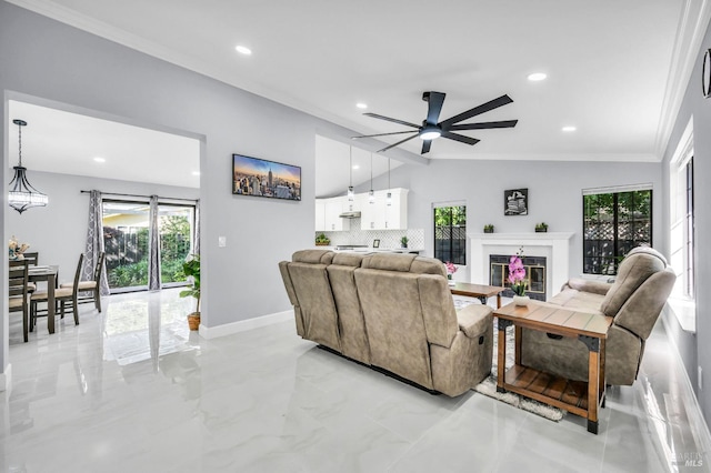4187 Tokay Dr, Napa, CA 94558 - living area with a ceiling fan, vaulted ceiling, ornamental molding, light marble finish flooring, and a glass covered fireplace
