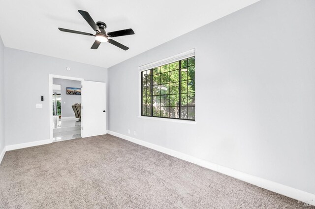 4187 Tokay Dr, Napa, CA 94558 - unfurnished bedroom featuring carpet flooring, baseboards, and a ceiling fan