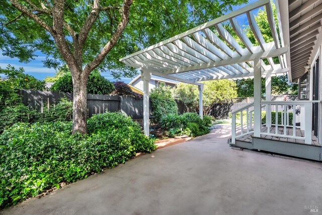 4187 Tokay Dr, Napa, CA 94558 - view of patio with a pergola and a fenced backyard