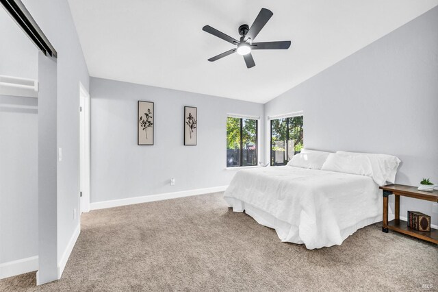 4187 Tokay Dr, Napa, CA 94558 - carpeted bedroom featuring baseboards, vaulted ceiling, and ceiling fan