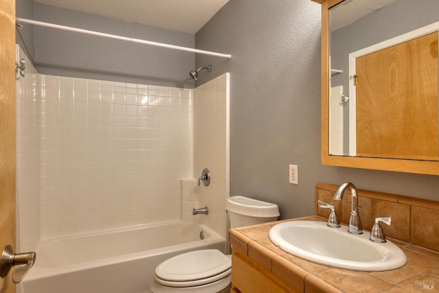 16589 Glenda Dr, Guerneville, CA 95446 - full bathroom featuring shower / bath combination, toilet, a textured wall, and vanity