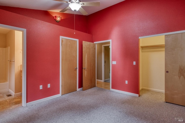16589 Glenda Dr, Guerneville, CA 95446 - unfurnished bedroom with lofted ceiling, carpet, a ceiling fan, and ensuite bath