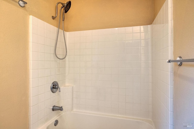 16589 Glenda Dr, Guerneville, CA 95446 - bathroom featuring shower / tub combination and a textured wall
