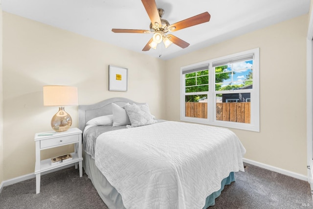 bedroom featuring ceiling fan, baseboards, and carpet flooring