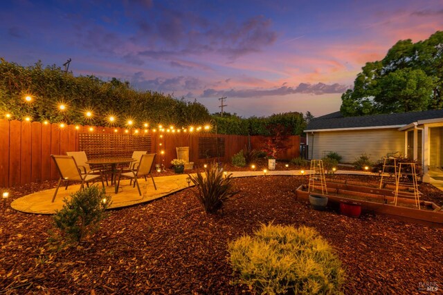 1629 Ora Dr, Napa, CA 94559 - fenced backyard with a vegetable garden and a patio