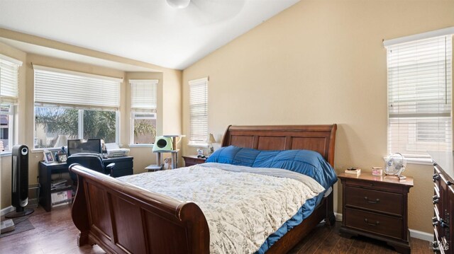 1220 Bello Dr, Dixon, CA 95620 - bedroom with vaulted ceiling, dark wood-type flooring, and baseboards