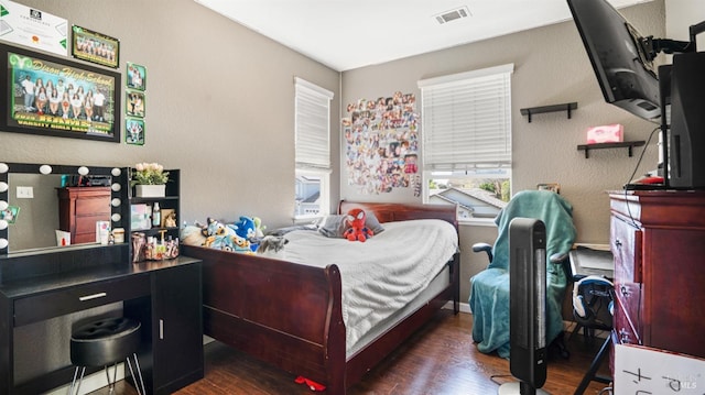 1220 Bello Dr, Dixon, CA 95620 - bedroom featuring wood finished floors and visible vents