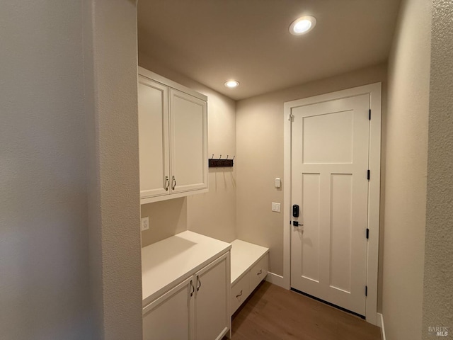 mudroom with recessed lighting and wood finished floors