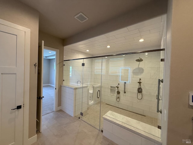 bathroom with recessed lighting, visible vents, a shower stall, and tile patterned floors
