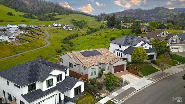 aerial view featuring a residential view and a mountain view