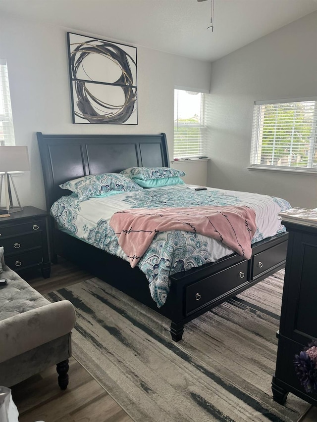 bedroom with wood finished floors