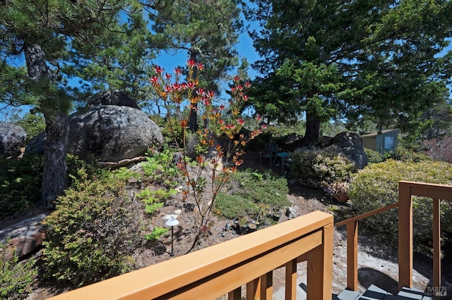 42227 Roseman Creek Rd, Gualala, CA 95445 - bedroom with beamed ceiling, wooden ceiling, and finished concrete floors
