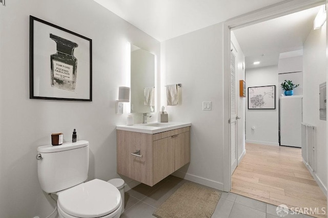 88 Arkansas St Unit 515, San Francisco, CA 94107 - bathroom featuring toilet, vanity, baseboards, and tile patterned floors